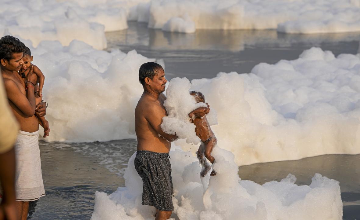 In Photos: Toxic foam seen floating on Yamuna River in Kalindi Kunj area