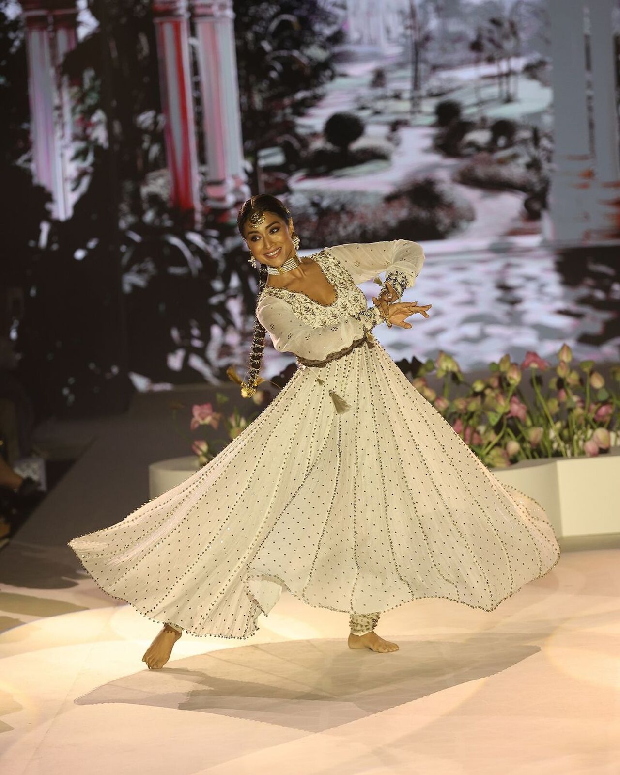 Shriya stood out with her appearance as the showstopper as she skipped the usual walk for a dance performance. She made a grand appearance, dressed in a stunning ivory and gold anarkali, and performed a graceful Kathak dance, inspired by Umrao Jaan, to the tune of 'In Aakhon Ki Masti'