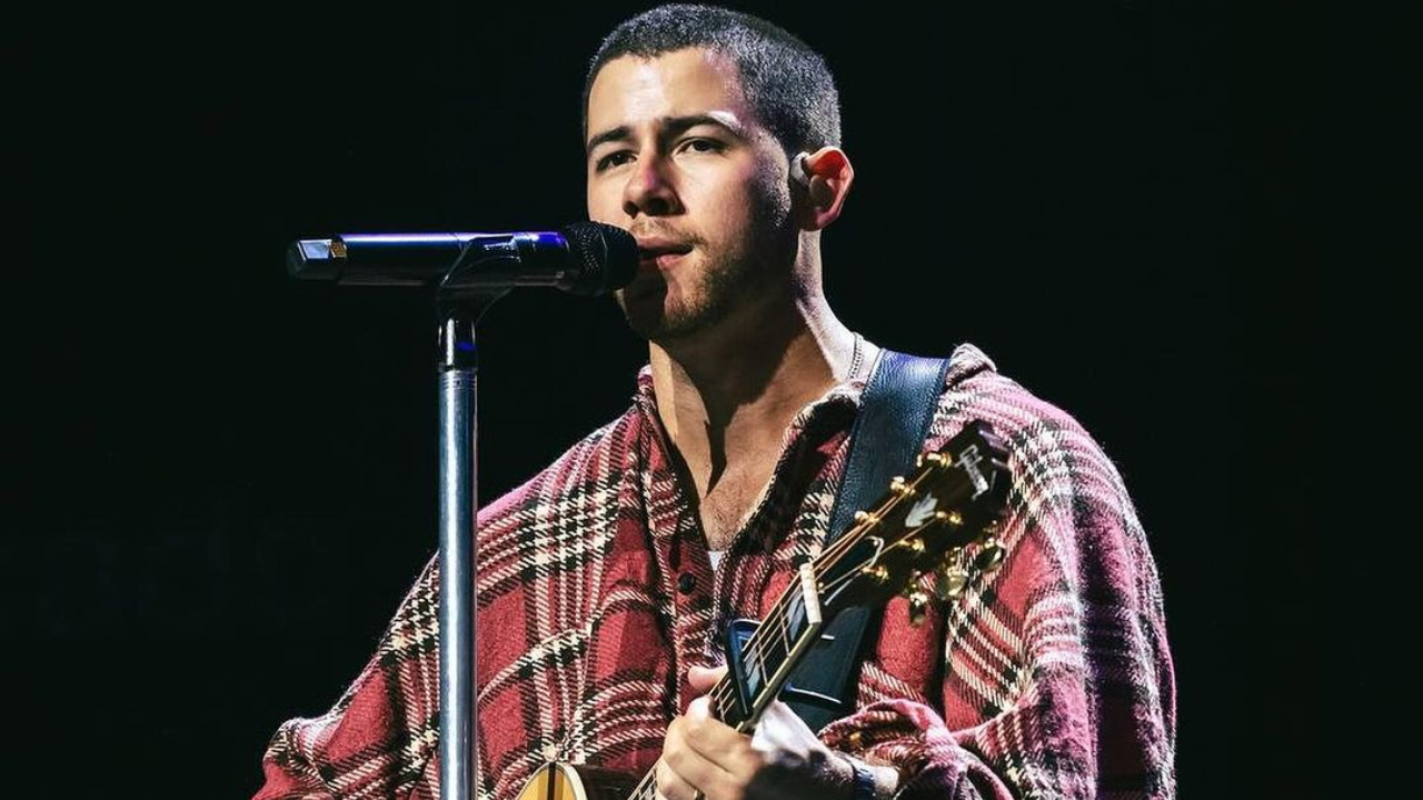 Nick Jonas flees stage after a laser gets aimed at his head at Prague concert, fans call out lax security. Read more