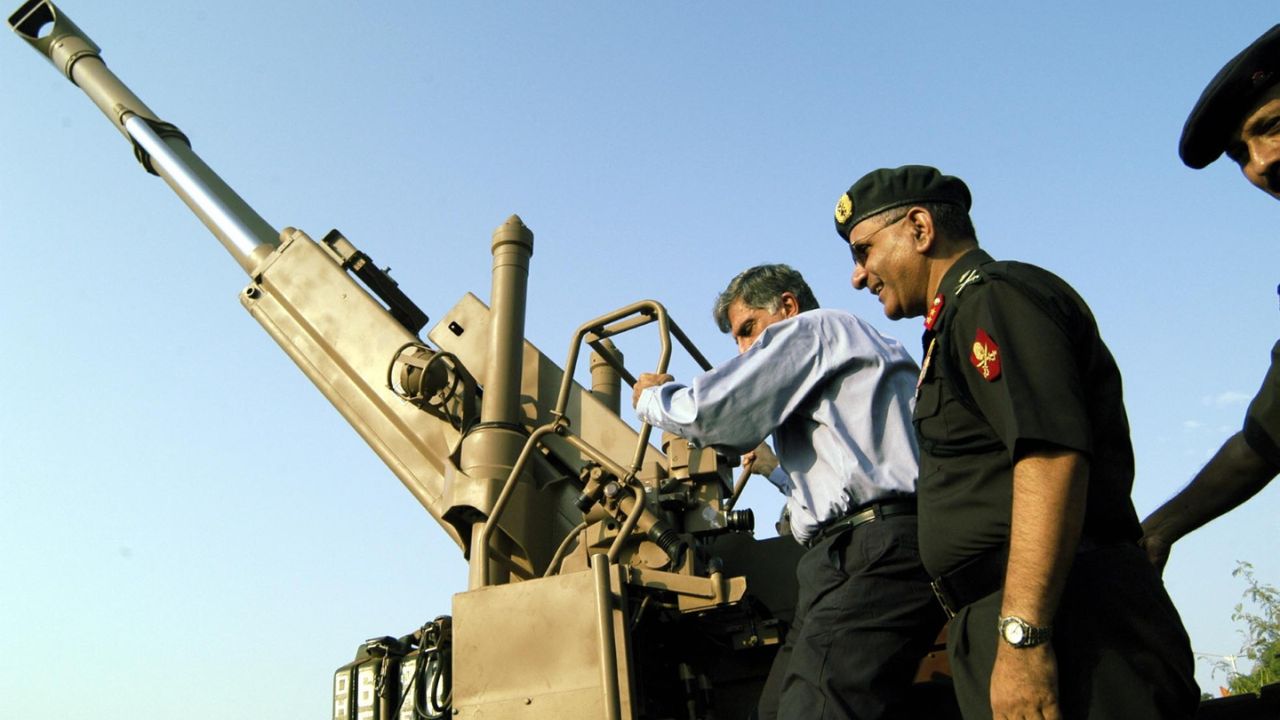 Ratan Tata, chairman of Tata Sons Ltd climbing the famous Bofors Gun which was kept at an exhibition--Know Your Army--at Shivaji Park.