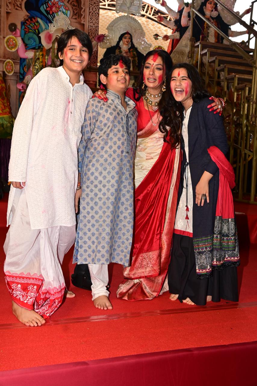 Rupali Ganguly was snapped wearing a beautiful red and white Bengali saree